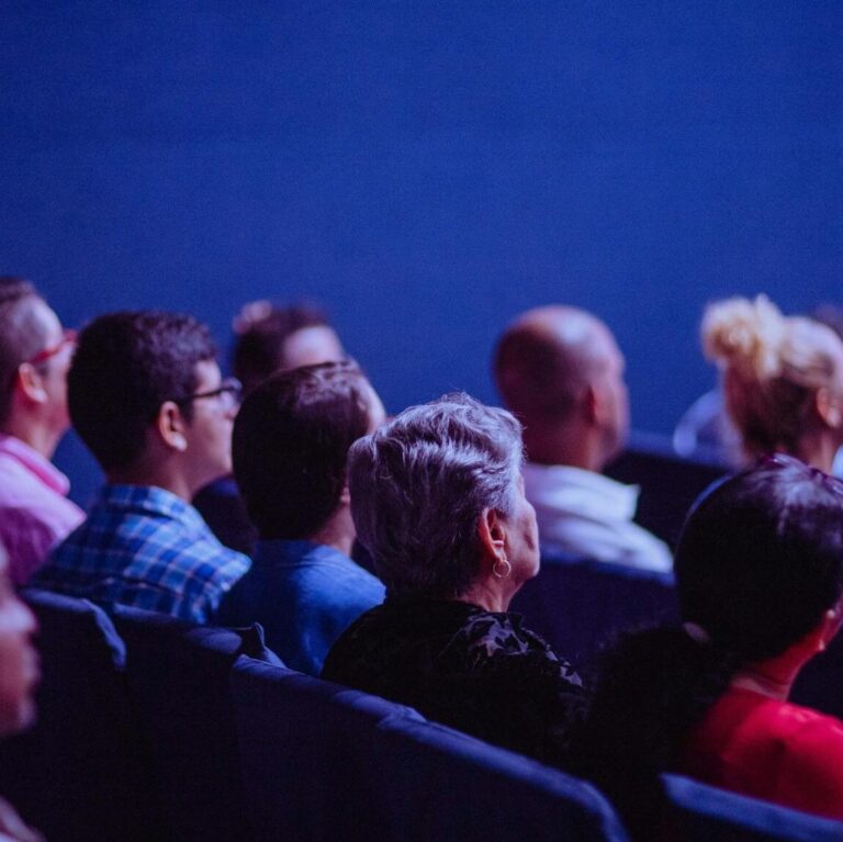 People Sitting on Gang Chairs